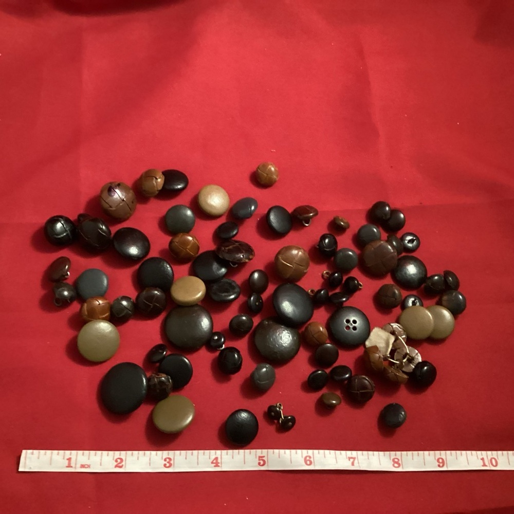 Leather or similar looking material buttons lot